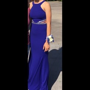 Long flowing true blue prom dress.